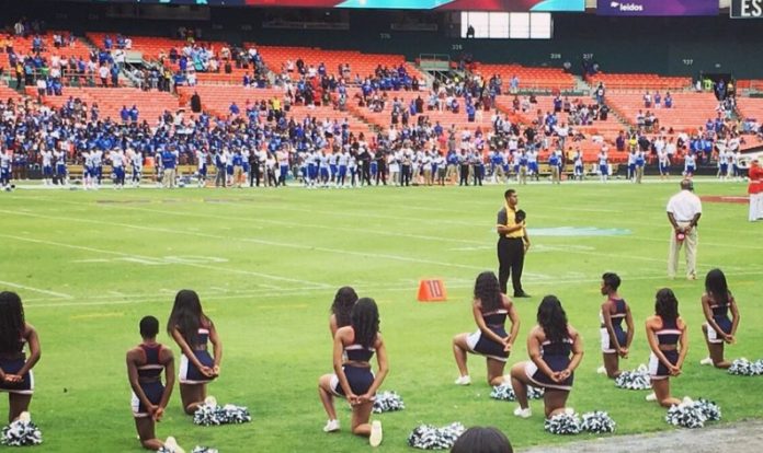 Howard’s Cheerleaders Kneel During National Anthem