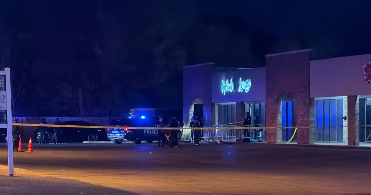 Police officers investigate a shooting scene outside a nightclub in Memphis